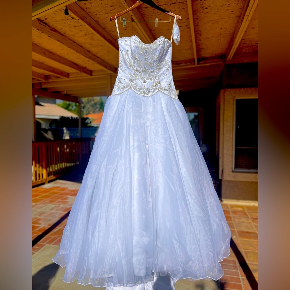 Beautiful, brand new, cathedral length wedding gown from Bellasposa